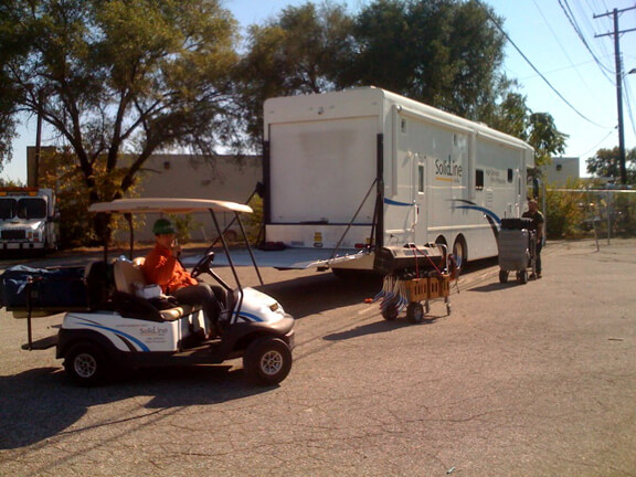 Eddie hauls some of our more delicate high def equipment in the SolidLine Golf Cart