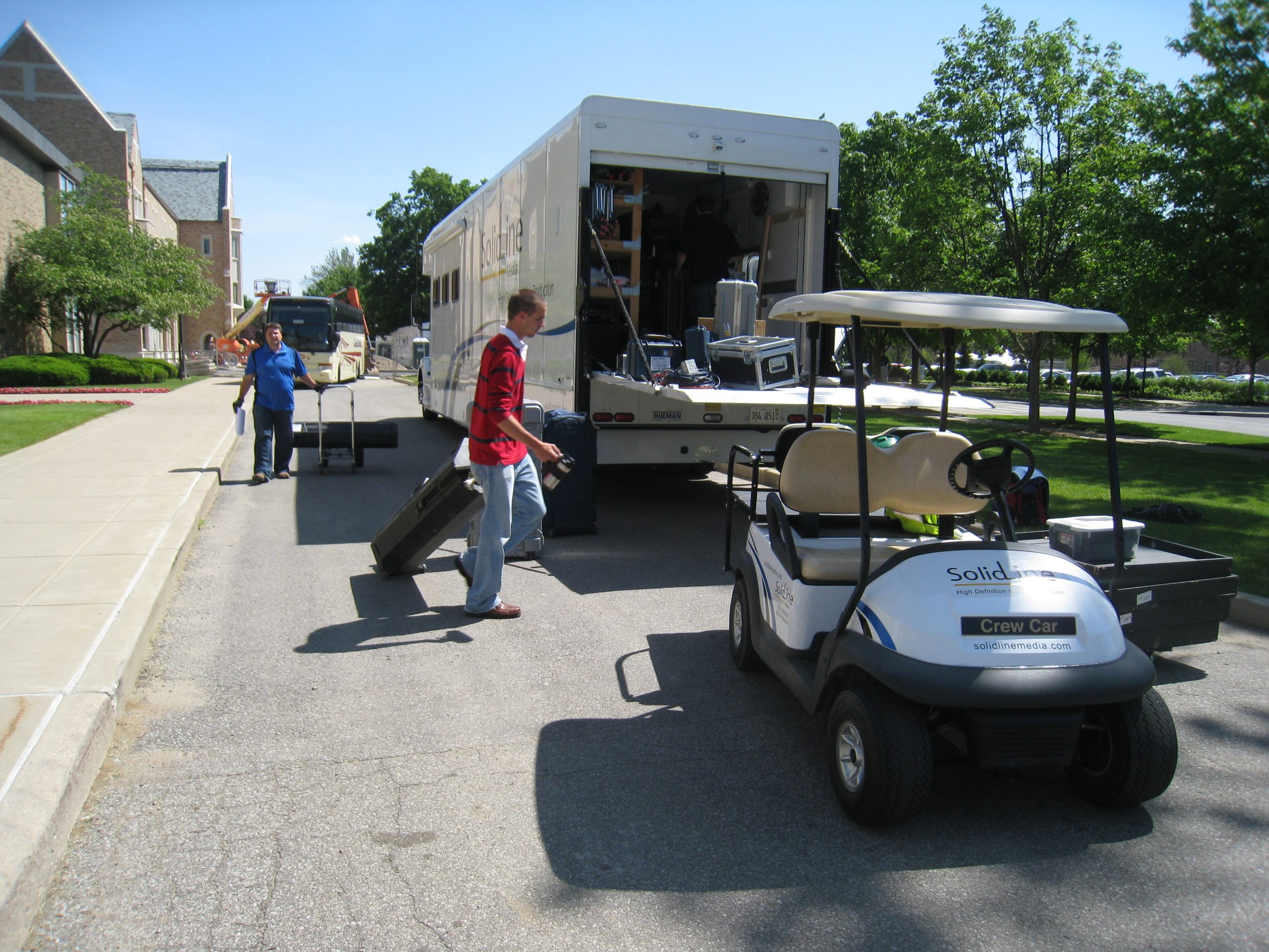 Loading I got back on my feet after tipping over the cart and continued to load the truck with the crew.