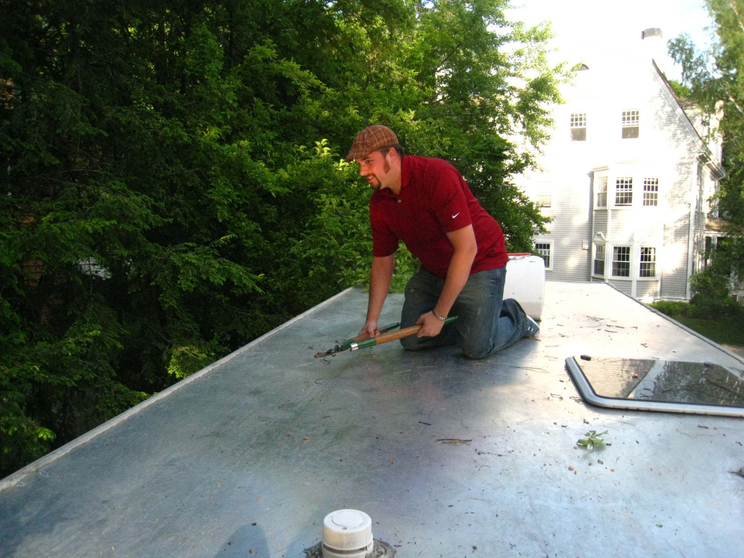 From the Top 3 Greg Vass cuts limbs from the other end of the roof. Not sure why he decided to go up there, especially since he still had the air cast on his foot. But I didn't say anything...